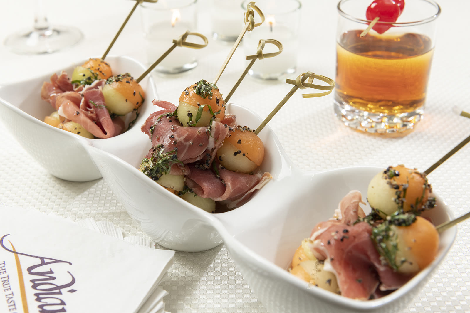 Prosciutto and melon skewers served as tray-passed hors d'oeuvres